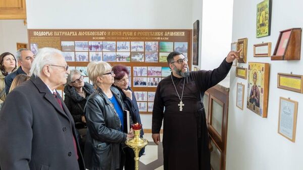 Выставка на выездном лектории ко Дню единых действий в память о геноциде советского народа нацистами в годы ВОВ (19 апреля 2026). Гюмри - Sputnik Армения