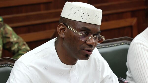 Министр обороны Мали Садио Камара на встрече с российским коллегой (13 августа 2024). Москвa - Sputnik Армения