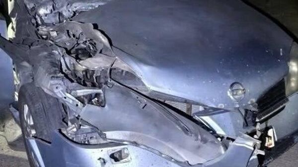 Последствия удара украинского дрона по движущемуся автомобилю в городе Щебекино (21 мая 2026). Белгородский район, Россия - Sputnik Армения