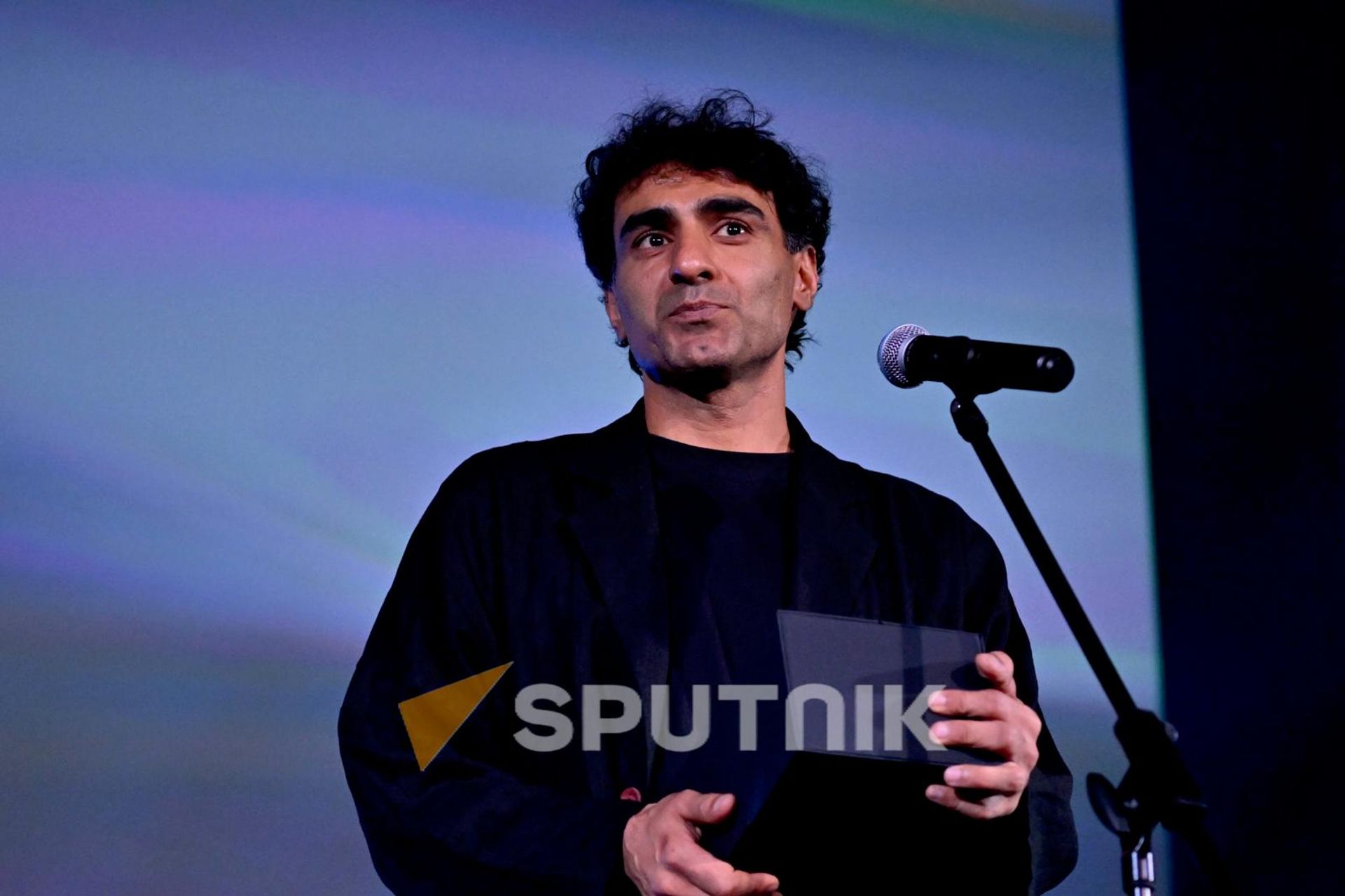 Лауреат 23-го Международного кинофестиваля Золотой абрикос Амир Азизи (19 июля 2026). Еревaн Лауреат 23-го Международного кинофестиваля Золотой абрикос Амир Азизи (19 июля 2026). Еревaн - Sputnik Արմենիա, 1920, 19.07.2026