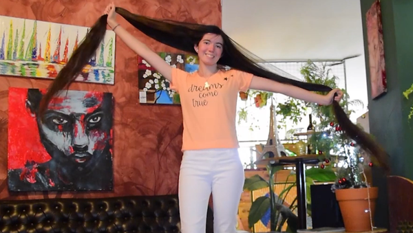 Рапунцель из Аргентины: девушка отрастила волосы длиной 1.53 м - Sputnik Армения