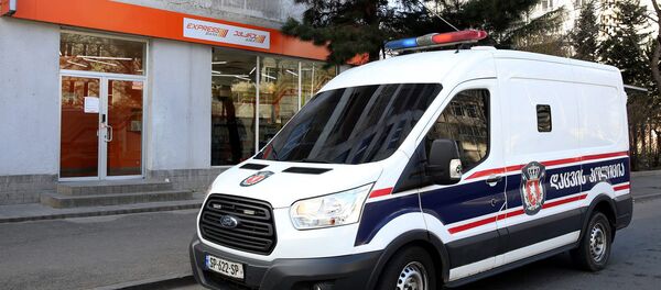 Машина охранной полиции сервис-центра Банка Грузии Машина охранной полиции сервис-центра Банка Грузии - Sputnik Արմենիա