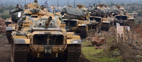 Турецкий военный конвой близ города Хасса у турецко-сирийской границы - Sputnik Армения