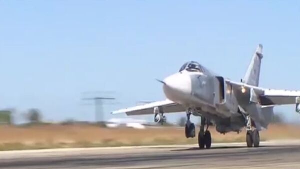 СПУТНИК_Момент сброса бомбы с российского самолета Су-24М на боевом вылете в Сирии - Sputnik Արմենիա