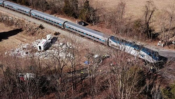 Место столкновения поезда компании Amtrak (31 января 2018). Крозет, Вирджиния, США - Sputnik Արմենիա