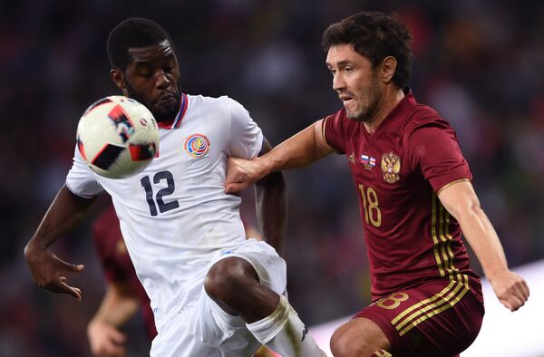 Игрок сборной Коста-Рики Хоэль Кэмпбелл (слева) и игрок сборной России Юрий Жирков в товарищеском матче между сборными двух стран в 2016 году. Игрок сборной Коста-Рики Хоэль Кэмпбелл (слева) и игрок сборной России Юрий Жирков в товарищеском матче между сборными двух стран в 2016 году. - Sputnik Армения