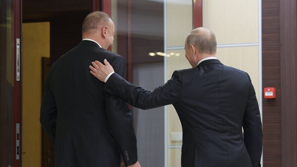 Президенты РФ и Азербайжана Владимир Путин и Ильхам Алиев на неформальной встрече глав государств СНГ - Sputnik Արմենիա