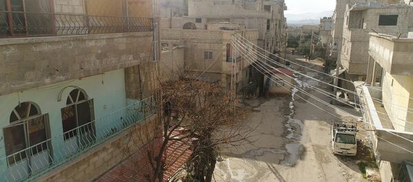 Гуманитарный коридор между Дамаском и Восточной Гутой в районе лагеря беженцев Вафидин в Сирии. - Sputnik Армения