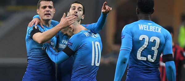 Футболисты ФК Арсенал празднуют гол в матче Лиги Европы Милан - Арсенал (8 марта 2018). Милан, Италия Футболисты ФК Арсенал празднуют гол в матче Лиги Европы Милан - Арсенал (8 марта 2018). Милан, Италия - Sputnik Армения