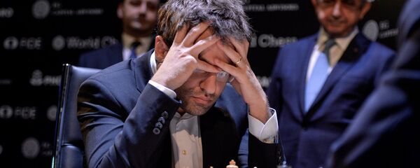 Партия Левон Аронян - Дин Лирен на турнире претендентов на звание чемпиона мира по шахматам (10 марта 2018). Берлин, Германия - Sputnik Армения