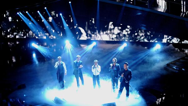 Выступление группы Take That на 61-ом песенном конкурсе Сан Ремо (18 февраля 2011). Италия - Sputnik Армения