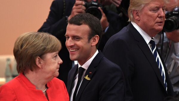 Президент Франции Эммануэль Макрон, канцлер Германии Ангела Меркель и президент США Дональд Трамп во время встречи G20 /7 июля 2017/. Гамбург, Германия - Sputnik Армения