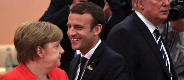 Президент Франции Эммануэль Макрон, канцлер Германии Ангела Меркель и президент США Дональд Трамп во время встречи G20 /7 июля 2017/. Гамбург, Германия - Sputnik Армения