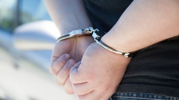Арестованный в наручниках - Sputnik Արմենիա