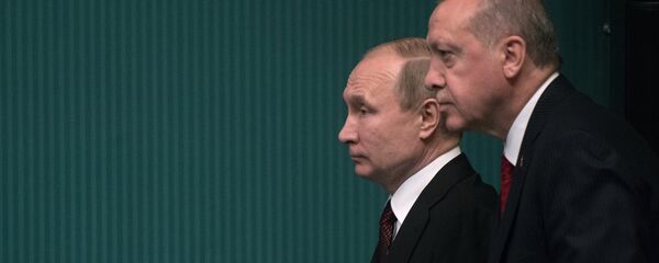 Президенты РФ и Турции Владимир Путин и Реджеп Тайип Эрдоган на церемонии запуска начала строительства первого энергоблока атомной электростанции Аккую (3 апреля 2018). Анкара, Турция - Sputnik Армения