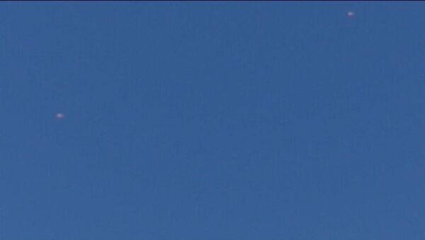 СПУТНИК_Очевидцы сняли на видео два парашюта в небе после падения Су-24 в Сирии - Sputnik Արմենիա