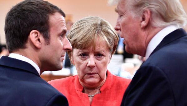 Президент Франции Эммануэль Макрон, канцлер Германии Ангела Меркель и президент США Дональд Трамп во время встречи G20 (7 июля 2017). Гамбург, Германия - Sputnik Армения