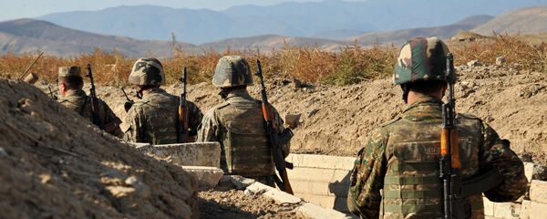Армянские военнослужащие на боевой позициии Армянские военнослужащие на боевой позициии - Sputnik Армения