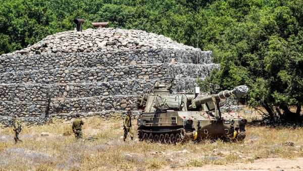 Израильская самоходная артиллерийская установка на Голанских высотах около сирийской границы (1 июля 2018). - Sputnik Армения