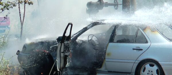 В Юго-западном массиве сгорел автомобиль (8 июля 2018). Еревaн В Юго-западном массиве сгорел автомобиль (8 июля 2018). Еревaн - Sputnik Արմենիա