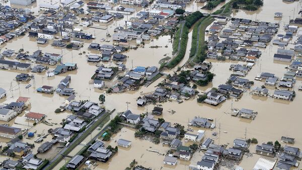 Затопленная после сильного дождя область в префектуре Окаяма (8 июля 2018). Курасики, Япония - Sputnik Արմենիա
