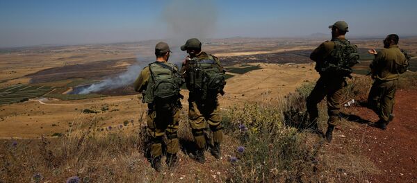 Израильские солдаты на военной базе в аннексированных Израилем сирийских Голанских высотах (7 июля 2018). - Sputnik Армения