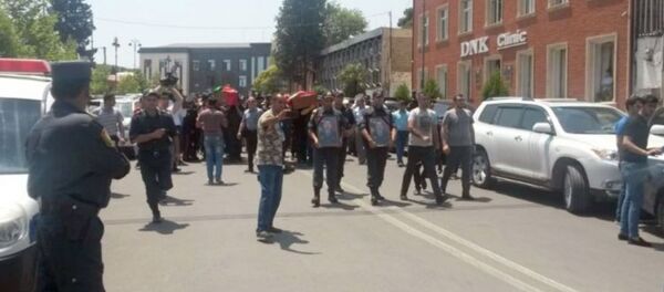 Церемония прощания с погибшими сотрудниками полиции в Гяндже Церемония прощания с погибшими сотрудниками полиции в Гяндже - Sputnik Արմենիա