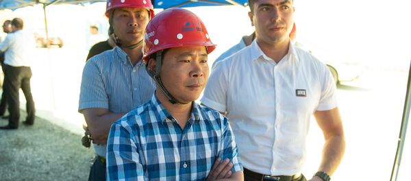 Сотрудники компании Sinohydro на презентации строительных работ автотрассы Север-Юг (18 июля 2018). Арагацотн - Sputnik Армения