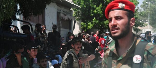 Вывоз боевиков и членов их семей из пригорода Дамаска в Идлиб. - Sputnik Армения