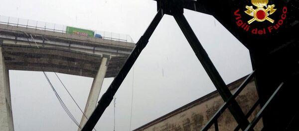 Обрушившийся автомобильный мост возле итальянского портового города Генуя (14 августа 2018). Италия Обрушившийся автомобильный мост возле итальянского портового города Генуя (14 августа 2018). Италия - Sputnik Армения