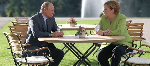 Президент РФ Владимир Путин и федеральный канцлер ФРГ Ангела Меркель во время встречи в резиденции правительства Германии (18 августа 2018). Мезеберг - Sputnik Армения
