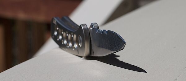 Мужчина с ножом, фото из архива - Sputnik Армения