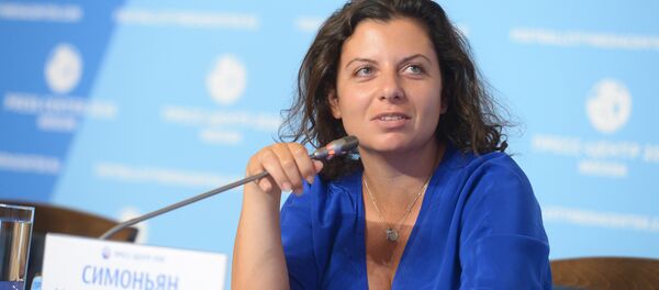 Главный редактор телеканала RT и МИА Россия сегодня Маргарита Симоньян во время видеоконференции с журналистами (12 июля 2018). Москвa - Sputnik Արմենիա