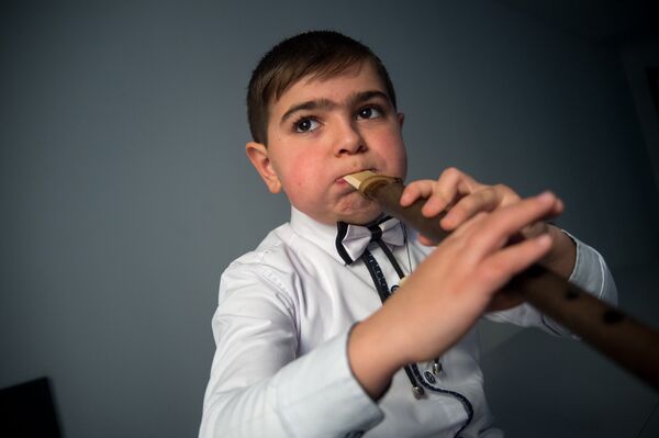 8-летний Татул Амбарцумян, играющий на дудуке 8-летний Татул Амбарцумян, играющий на дудуке - Sputnik Արմենիա