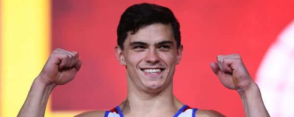 Артур Далалоян (Россия), занявший первое место в вольных упражнениях на церемонии награждения чемпионатa мира по спортивной гимнастике (2 ноября 2018). Доха - Sputnik Армения