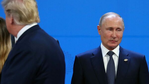 Президенты России и США Владимир Путин и Дональд Трамп на церемонии фотографирования перед саммитом G20 (30 ноября 2018). Буэнос-Айрес - Sputnik Армения