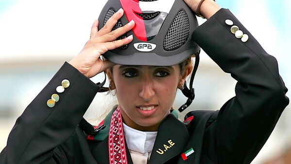 Дочь эмира Дубая, премьер-министра и вице-президента ОАЭ Мухаммеда бен Рашида Аль Мактума - Латифа на пьедестале почета победителей (11 декабря 2006). Дохa - Sputnik Армения