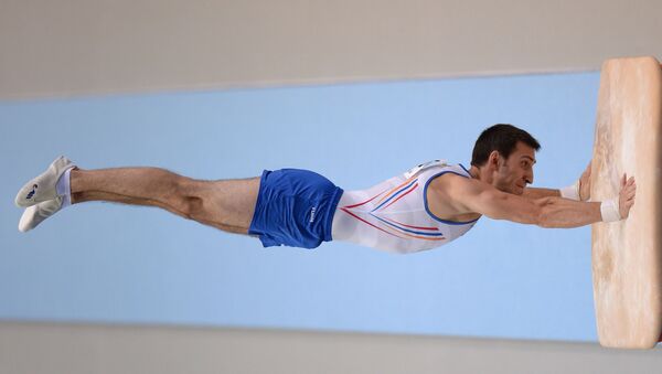 Артур Давтян выполняет опорный прыжок в личном первенстве среди мужчин на чемпионате Европы по спортивной гимнастике (29 мая 2016). Берн - Sputnik Արմենիա