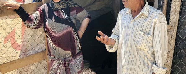 Сирийские беженцы в палаточном лагере в центральном Бекаа в поселении Каб Эльяс (11 августа 2018). Ливан Сирийские беженцы в палаточном лагере в центральном Бекаа в поселении Каб Эльяс (11 августа 2018). Ливан - Sputnik Армения