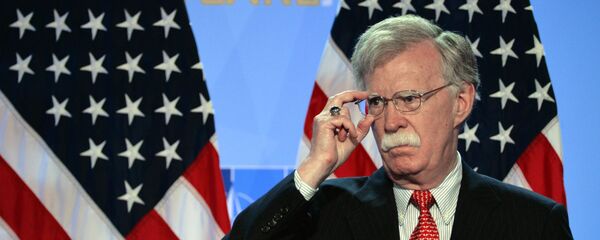 Советник президента США по вопросам нац.безопасности Джон Болтон во время пресс-конференции Дональда Трампа (12 июля 2018). Брюссель - Sputnik Армения