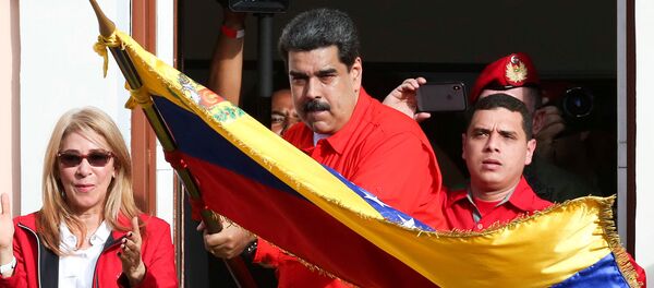 Президент Венесуэлы Николас Мадуро принимает участие в митинге в поддержку своего правительства (23 января 2019). Каракас - Sputnik Армения