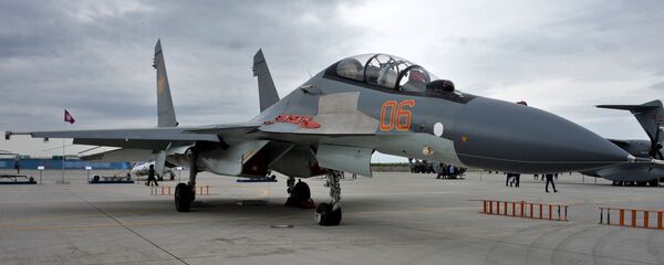 Многоцелевой фронтовой истребитель СУ-30СМ на V Международной выставке KADEX-2018 (24 мая 2018). Астана - Sputnik Армения