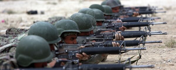 Солдаты афганской национальной армии на учениях огневой подготовки в афганской военной академии (31 октября 2018). Кабул - Sputnik Армения