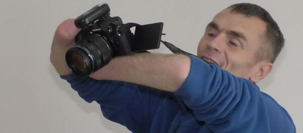 Фотограф бесплатно учит больных детей Фотограф бесплатно учит больных детей - Sputnik Армения