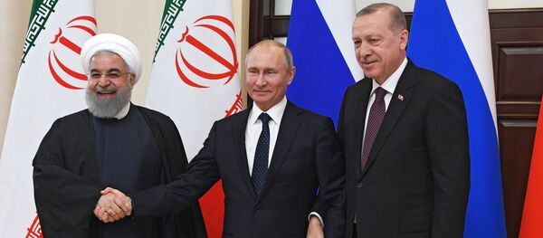 Президенты России, Турции и Ирана Владимир Путин, Реджеп Эрдоган и Хасан Рухани во время трёхсторонней встречи глав государств – гарантов астанинского процесса содействия сирийскому урегулированию (14 февраля 2019). Сочи - Sputnik Армения