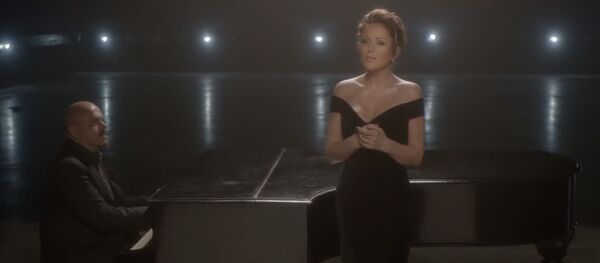 Кадр из клипа Юлии Началовой и Уолтера Афанасьева Жди меня - Sputnik Армения