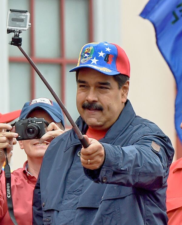 Президент Венесуэлы Николас Мадуро во время марша в Международный День труда (1 мая 2016). Каракас - Sputnik Армения