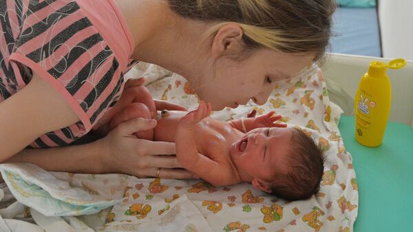 Мать с новорожденным - Sputnik Արմենիա