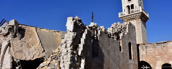 Поврежденный армянский Апостольский Собор Сорока Мучеников в районе Старого Алеппо (9 декабря 2016). Сирия - Sputnik Армения