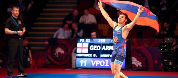 Армянский борец Арсен Арутюнян на Чемпионате Европы по борьбе после победы в финале с грузинским борцом Бекой Ломтадзе (10 апреля 2019). Бухарест - Sputnik Արմենիա